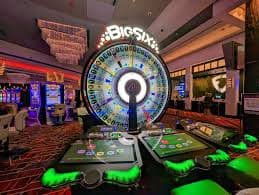 Gaming activity filter showing slots, live tables, and sports betting categories